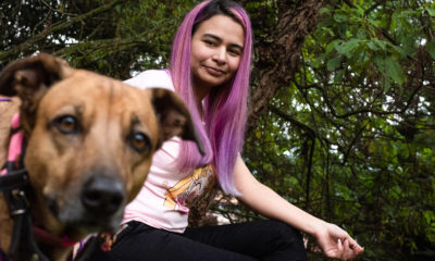 Oskarina with her dog, Molly.