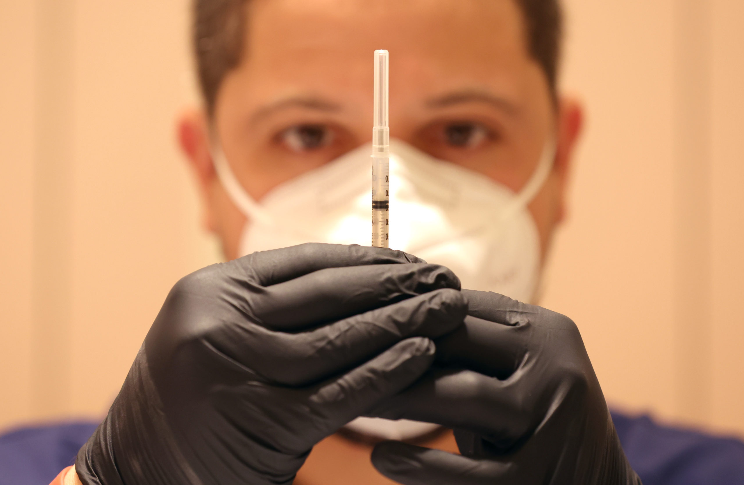 FDA advisers back Moderna's COVID-19 vaccine for older kids