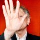 The Download: Geoffrey Hinton’s AI fears, and decoding our thoughts