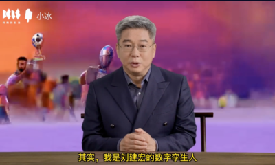Screenshot of a video while an elderly Chinese man sits in front of the table.