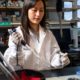 Julia Juong working with a stripette seen at a lab bench